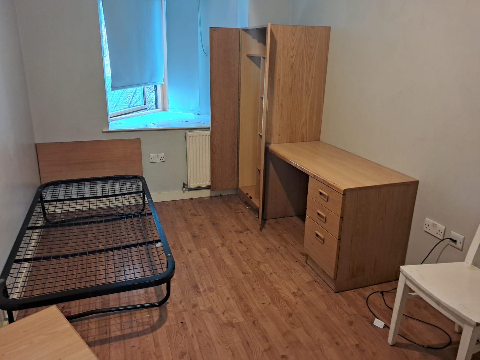 Bedroom cleared and cleaned after a deep clean