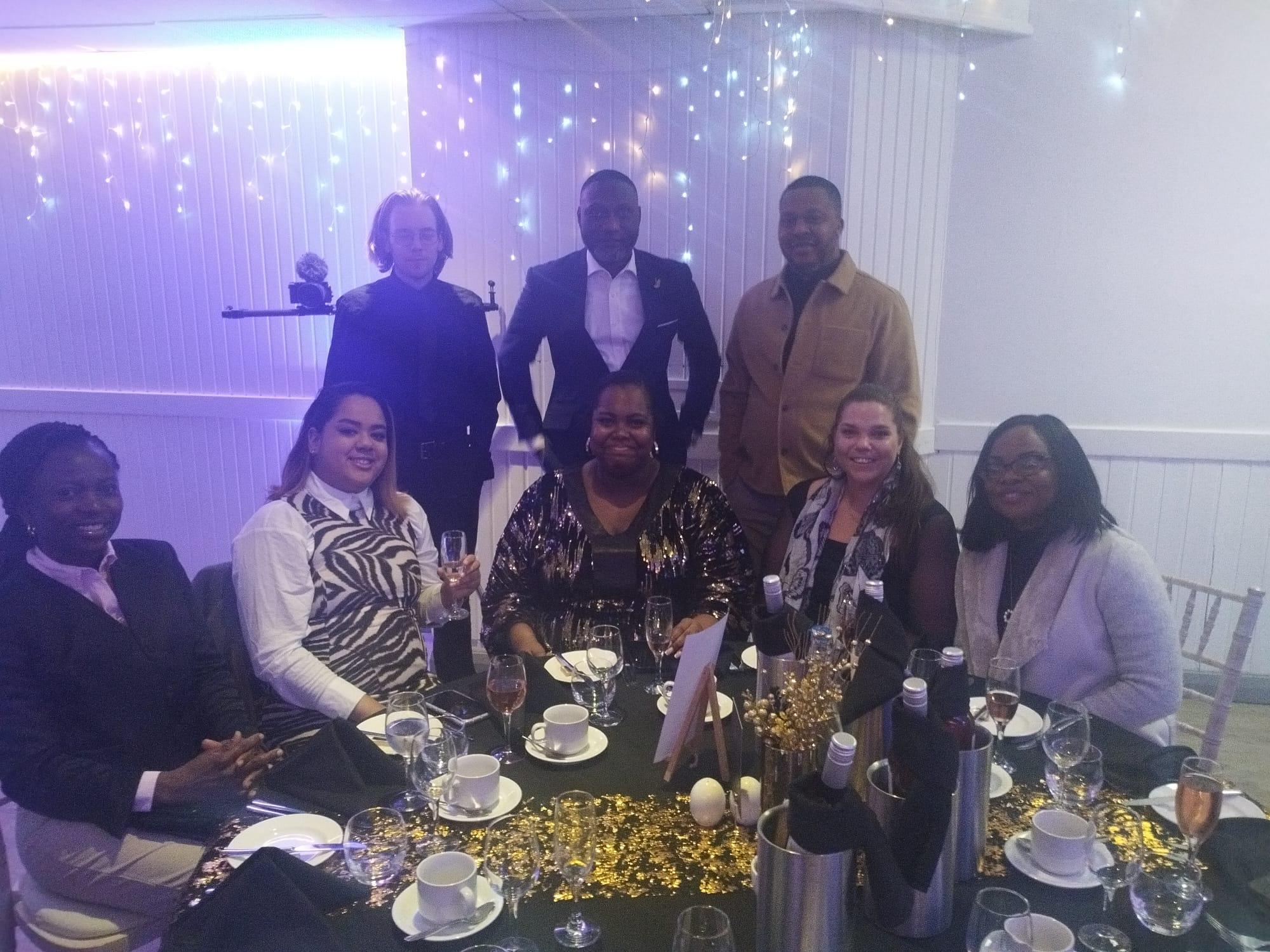 HHS Group staff celebrating at a charity awards evening